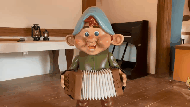 The Accordion-Playing Dwarf: A Kinetic Sculpture The Accordion-Playing Dwarf: A Kinetic Sculpture